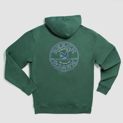 A green hoodie displayed flat with a large circular Beach & Barn logo and a chicken graphic printed on the back. The hoodie has long sleeves and a hood.