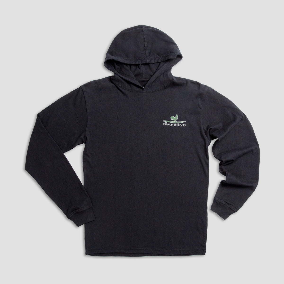 A black long-sleeve hooded sweatshirt is laid flat on a light gray background. The chest features a small green logo and the text BUCK&BARN in white.