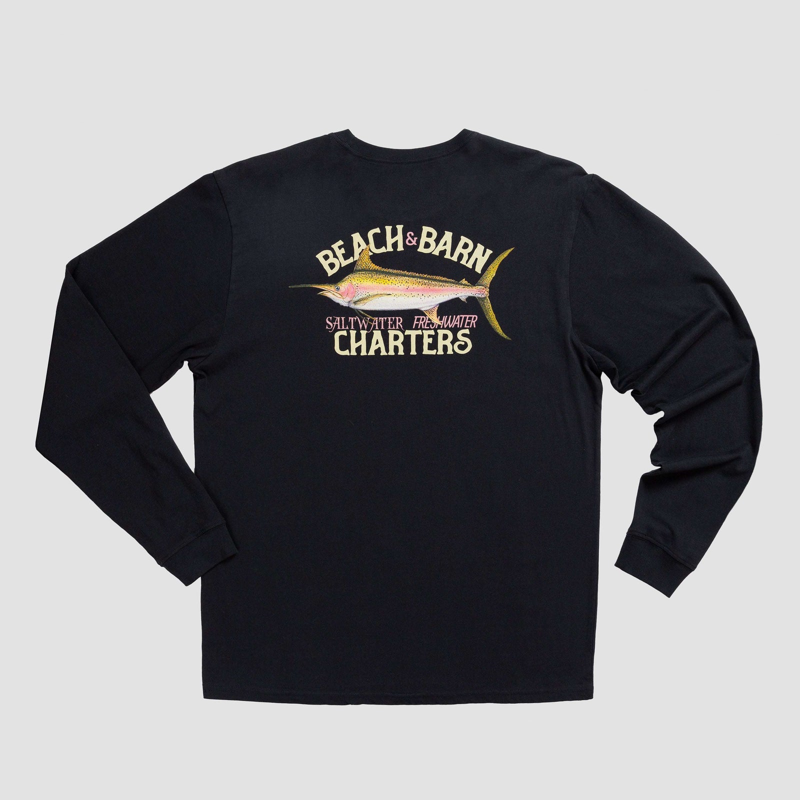 A black long-sleeve shirt with a large yellow fish graphic and the words Beach & Barn Charters Saltwater Freshwater printed on the back in bold letters.