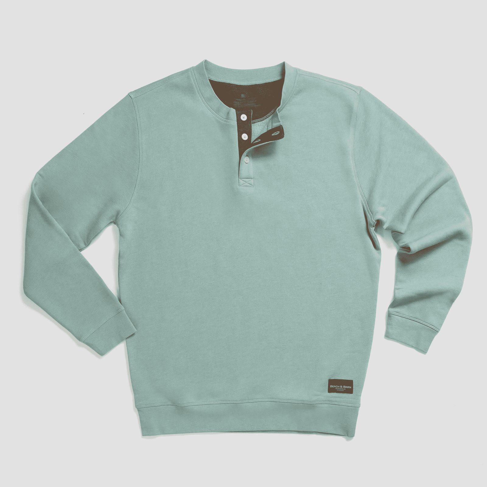 A brown long-sleeve pullover sweatshirt with a light blue inner collar, three buttons near the neckline, and a small black label on the bottom hem. The sweatshirt is laid flat on a white background.