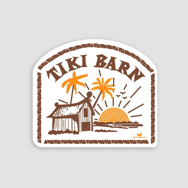 Sticker illustration of a tiki hut by the beach with palm trees, a setting sun, and the words TIKI BARN in bold brown letters, all framed by a decorative border.